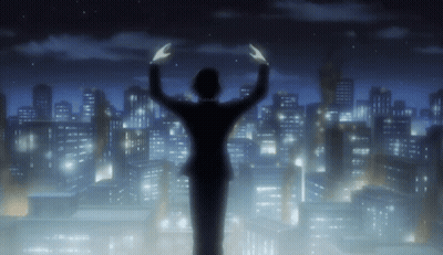 A Silhouette Of A Person Standing In Front Of A City At Night GIF