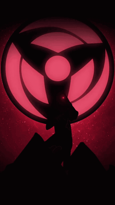 A Silhouette Of A Person Standing In Front Of A Red Eye GIF