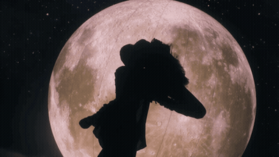 A Silhouette Of A Person Standing In Front Of The Full Moon GIF