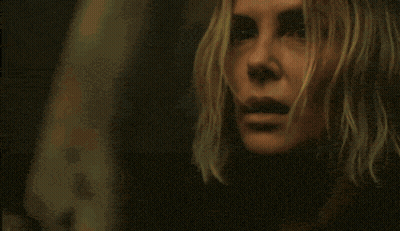 A Silhouette Of A Person Standing In Front Of Trees GIF