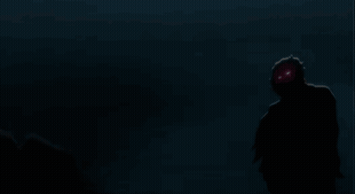 A Silhouette Of A Person Standing In The Dark With A Gray Background GIF
