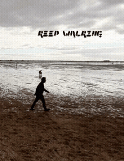 A Silhouette Of A Person Walking On A Beach With The Words " Keep Walking " On The Bottom GIF