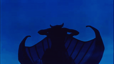 A Silhouette Of A Person With Wings In The Dark GIF