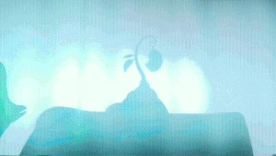 A Silhouette Of A Plant Growing Out Of The Ground GIF