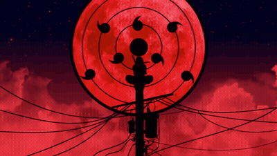A Silhouette Of A Telephone Pole In Front Of A Red Moon GIF