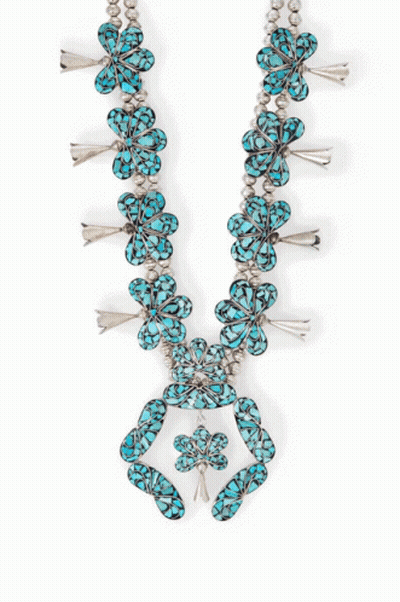 A Silver And Turquoise Ring With A Circle Of Turquoise Stones GIF