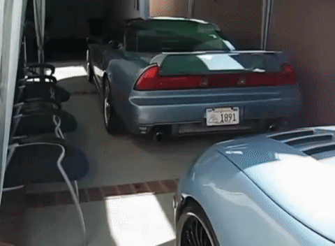 A Silver Car With A California License Plate That Says 1891 GIF