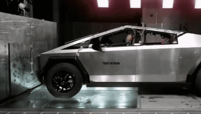 A Silver Car With The Number Test-87566 On The Side GIF