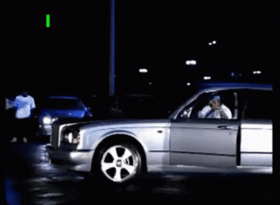 A Silver Car With The Words " I Puts In Werk " On The Top GIF