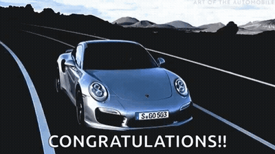 A Silver Porsche Is Driving Down A Road With The Words Congratulations Written Below It GIF