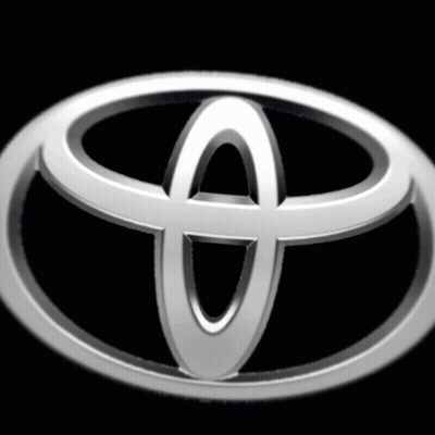 A Silver Toyota Logo Is Against A Black Background GIF