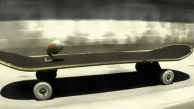 A Skateboard With A Ball On It Is Going Down A Road GIF