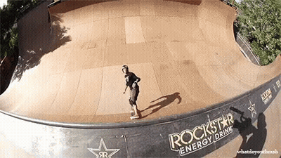 A Skateboarder Is Doing A Trick On A Ramp That Says Rockstar Energy Drink On It GIF