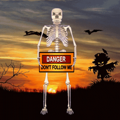 A Skeleton Is Holding A Sign That Says Danger Don T Follow Me GIF