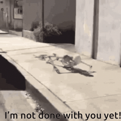 A Skeleton Is Walking Down A Sidewalk And Says `` I 'M Not Done With You Yet ! '' GIF