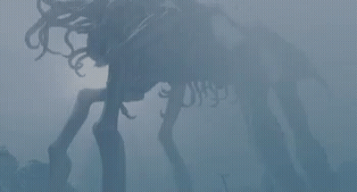 A Skeleton Of A Horse Is Standing In The Fog In The Dark . GIF