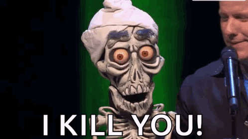 A Skeleton Puppet Is Standing In Front Of A Man Holding A Microphone And Saying I Kill You . GIF