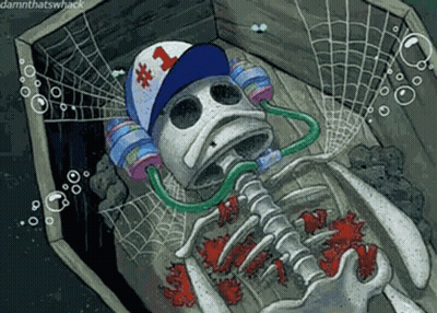 A Skeleton Wearing A Hat Is Laying In A Coffin Surrounded By Bubbles . GIF