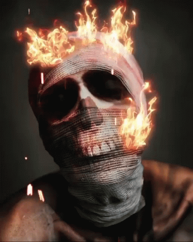 A Skeleton With A Bandage Around His Head Is On Fire GIF