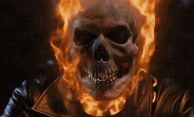 A Skull With Flames Coming Out Of It GIF