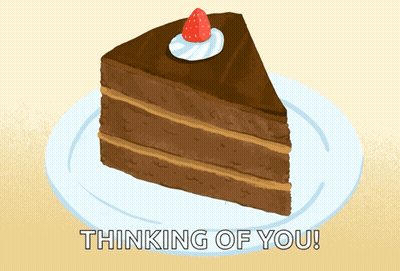 A Slice Of Chocolate Cake With A Strawberry On Top Is On A Plate With The Words " Thinking Of You " Below It GIF