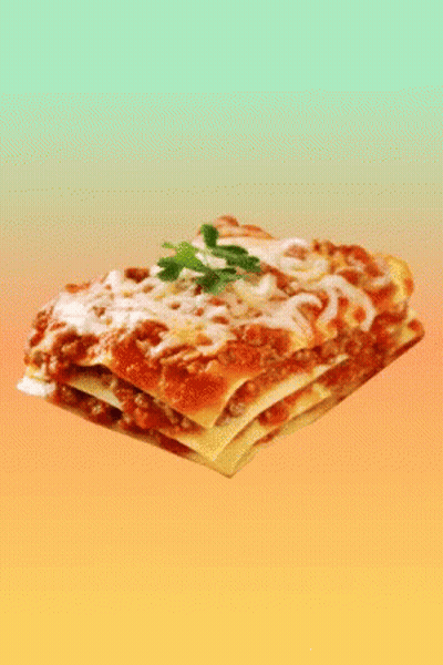 A Slice Of Lasagna With Tomato Sauce And Cheese On Top GIF