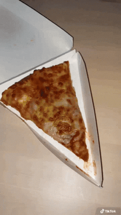 A Slice Of Pizza In A Box That Says Tik Tok On The Bottom GIF