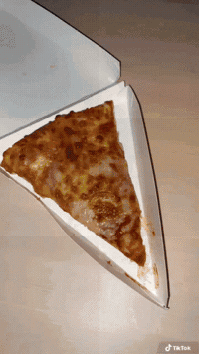 A Slice Of Pizza In A Box With Tiktok Written On The Bottom GIF