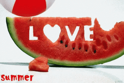 A Slice Of Watermelon With The Word Love Carved Out Of It GIF