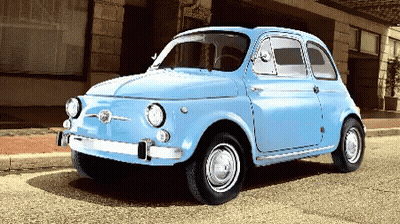 A Small Blue Car Is Parked On The Side Of The Road GIF