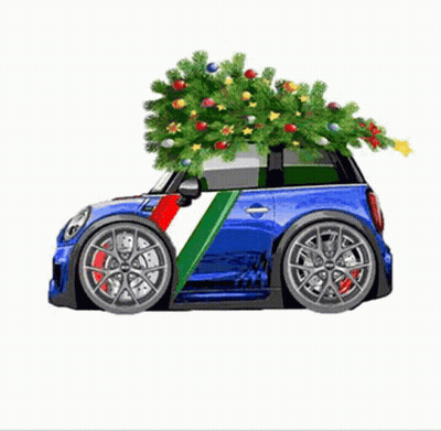 A Small Blue Car With A Christmas Tree On Top Of It GIF