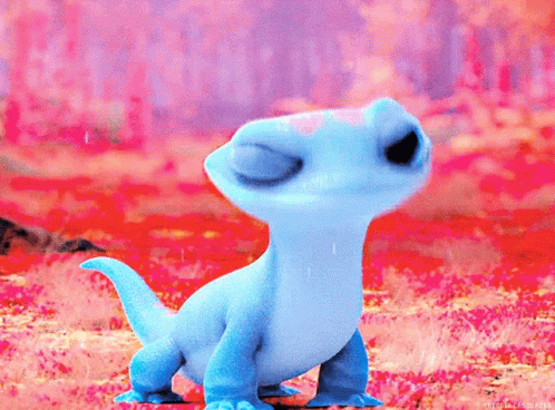 A Small Blue Lizard From Frozen Is Standing In A Field Of Flowers . GIF