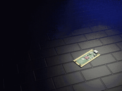 A Small Electronic Device Is Laying On A Black Tiled Floor GIF