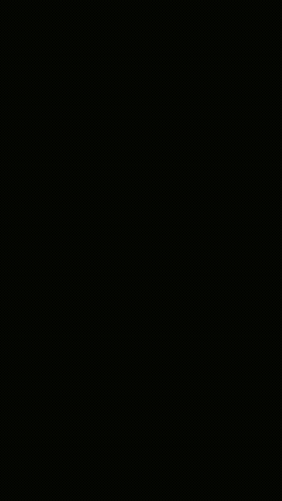 A Small Kitten Is Sitting On A Blanket With Its Mouth Open And Yawning . GIF