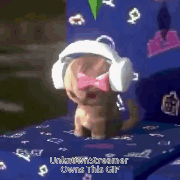 A Small Puppy Wearing Headphones And A Bow Tie GIF