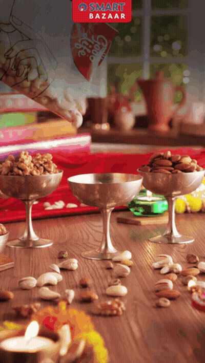 A Smart Bazaar Advertisement Shows A Person Pouring Nuts Into Bowls GIF