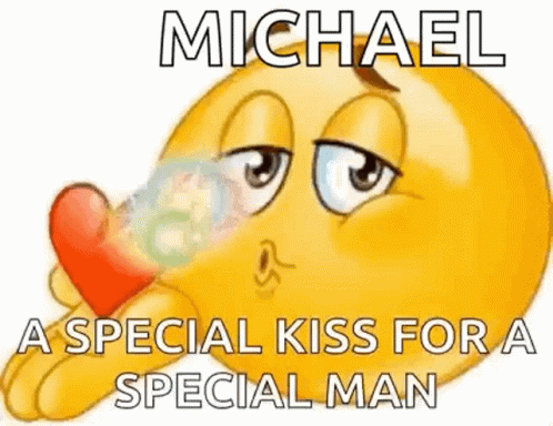 A Smiley Face Is Holding A Heart In Its Hand And Saying `` Michael , A Special Kiss For A Special Man '' . GIF