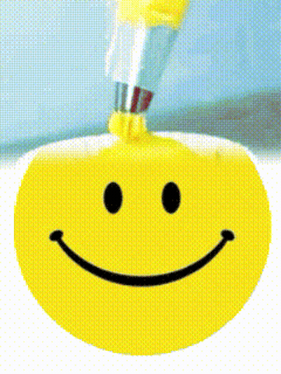 A Smiley Face With A Toothbrush In It GIF
