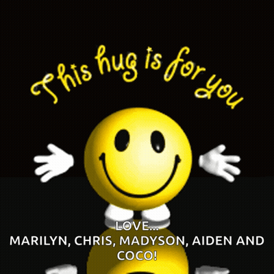 A Smiley Face With The Words " This Hug Is For You " On It GIF
