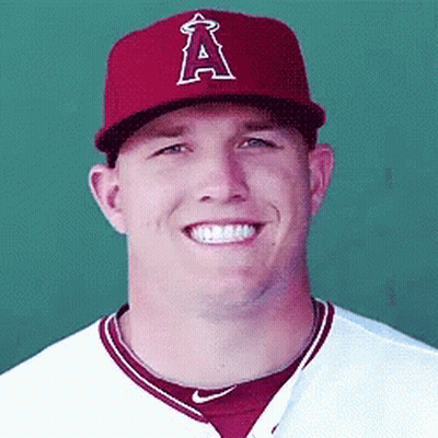 A Smiling Baseball Player Wearing A Red A Hat GIF