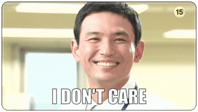 A Smiling Man With The Words " I Don T Care " On The Bottom GIF