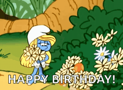 A Smurf Holding A Bunch Of Flowers With The Words Happy Birthday GIF