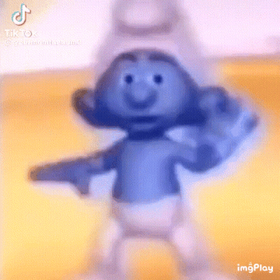 A Smurf Is Dancing And Pointing At The Camera With A Gun . GIF