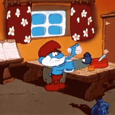 A Smurf Is Sitting At A Table Drinking Water GIF