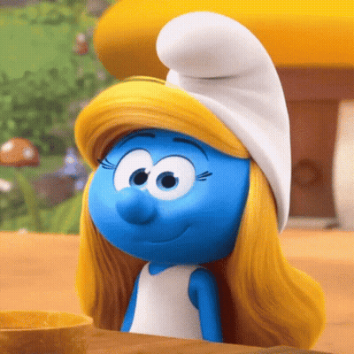 A Smurf With Blonde Hair And A White Hat Smiles GIF
