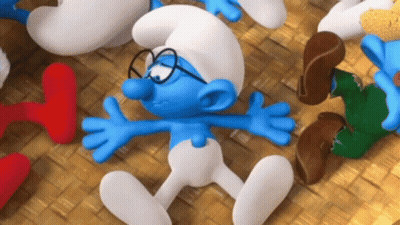 A Smurf With Glasses Is Laying On The Ground With His Arms Outstretched GIF