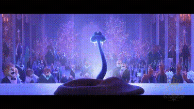 A Snake With A Long Neck Is Standing In Front Of A Crowd Of People At A Party . GIF
