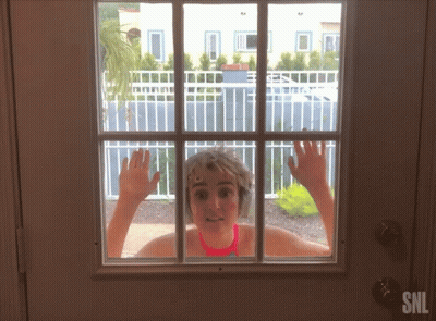 A Snl Logo Can Be Seen On The Door GIF