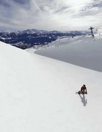 A Snowboarder Is Doing A Trick On A Snowy Slope And The Words Awesome Are Visible GIF