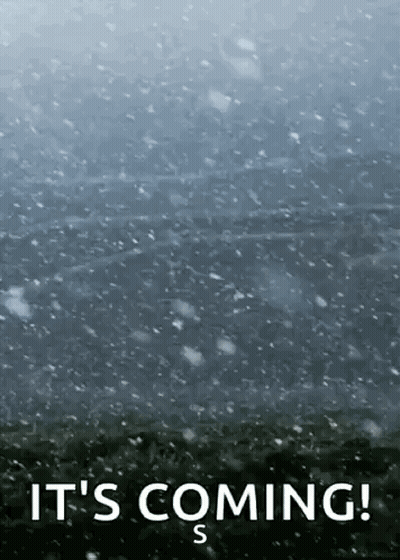 A Snowy Background With The Words `` It 'S Coming '' Written On It . GIF